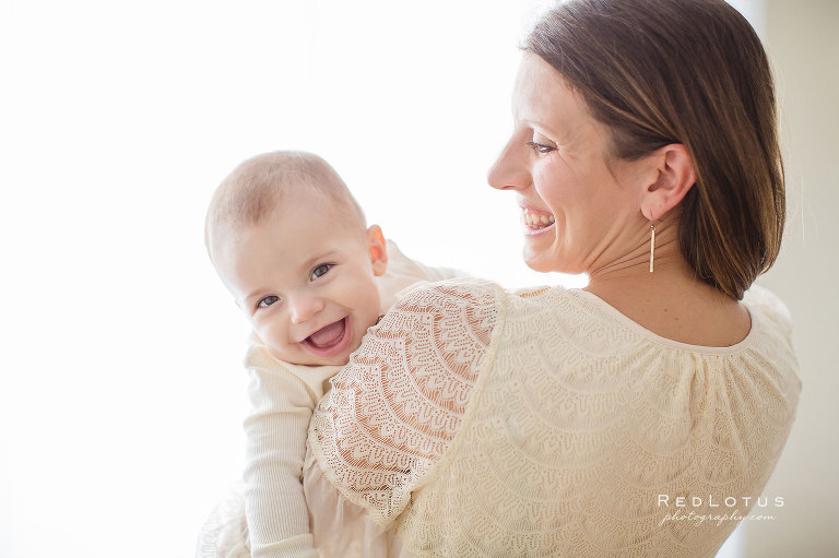 Baby photography - mother and child in neutral colors vintage lace baby smiling natural light