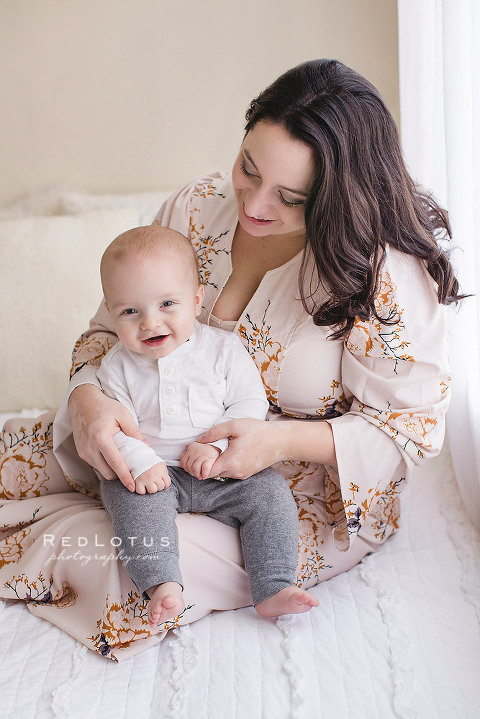 baby photography mother holding baby natural light studio pittsburgh neutral colors
