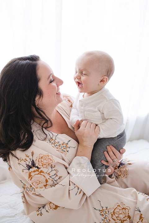 laughing baby and mother natural light studio portraits