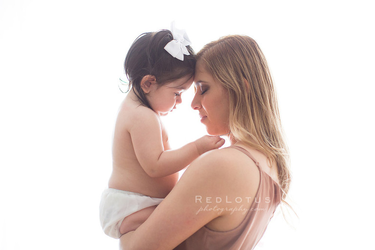 baby photos mother and child natural neutral colors window backdrop