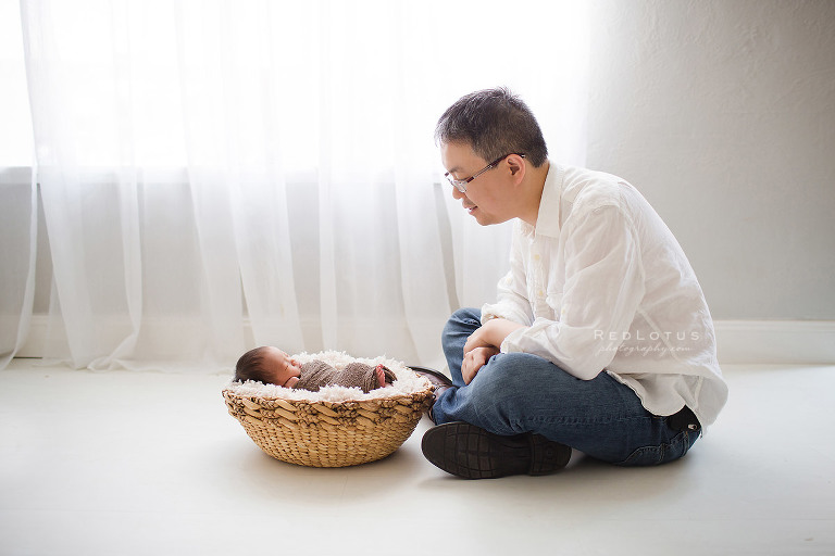 newborn photos dad and baby in basket