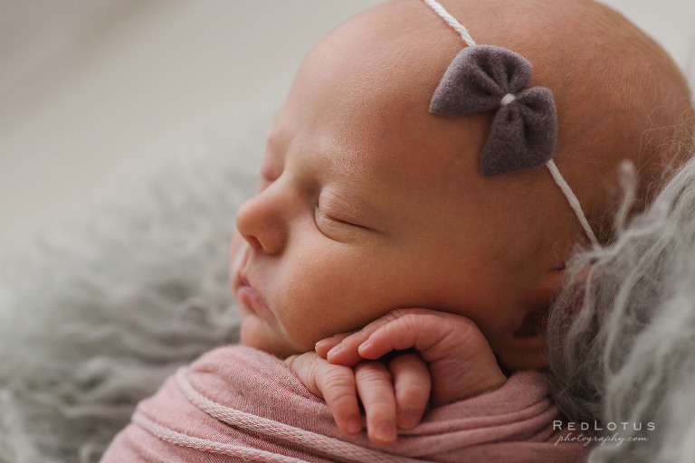 newborn baby girl close up of face