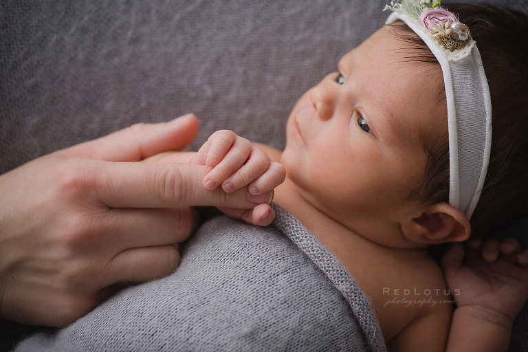 newborn photography close up of hands and fingers 