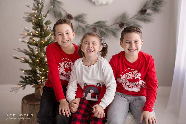 Christmas holiday photos siblings pajamas