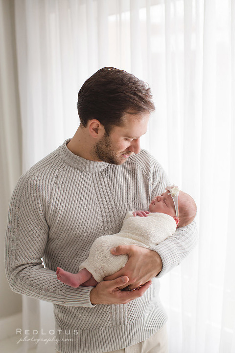 newborn photography baby and father