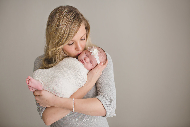 newborn photography mother and baby pose neutral colors