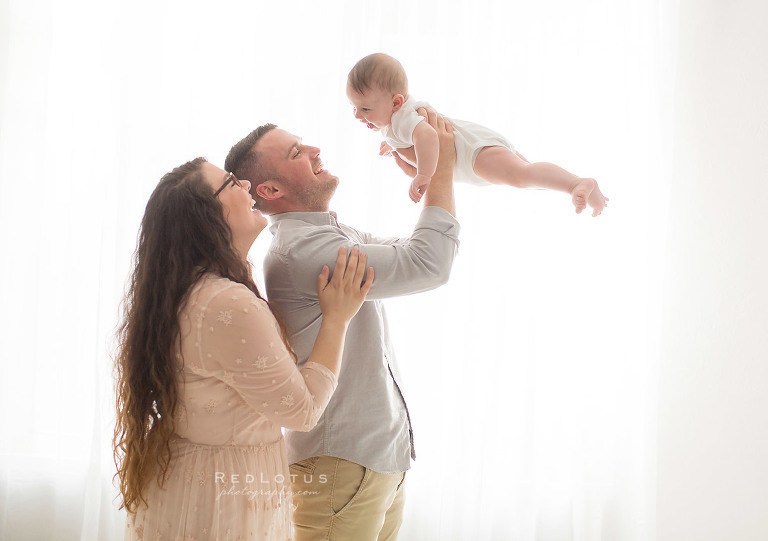 parents and 6 month old baby photos