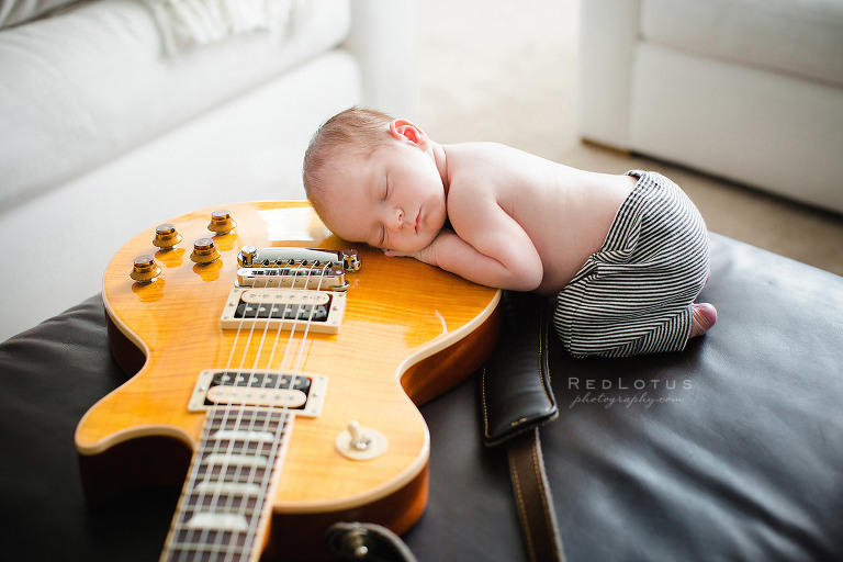 newborn baby with electric guitar