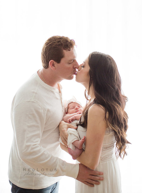 light and airy newborn photography neutral colors backlit window