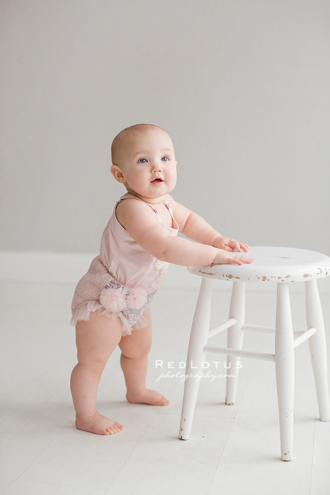 baby girl toddler one year old cruising