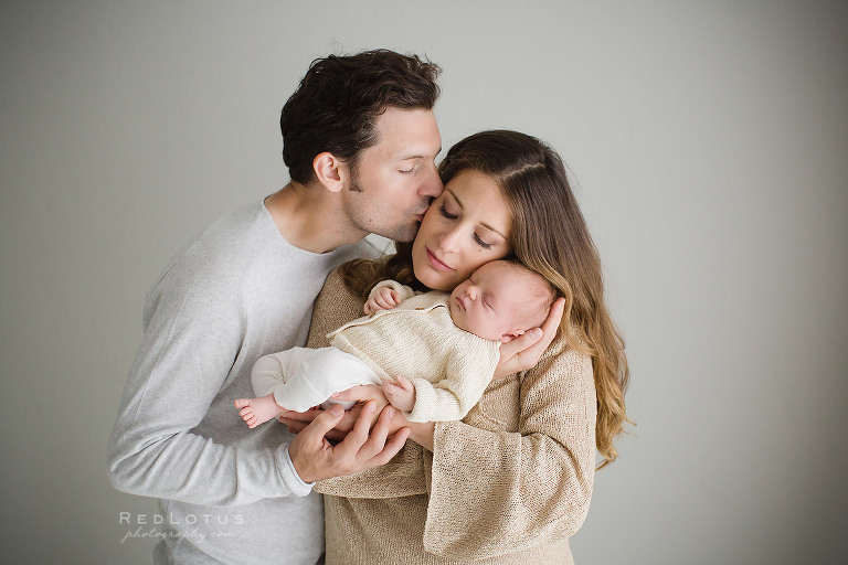 newborn photography pose parents and baby