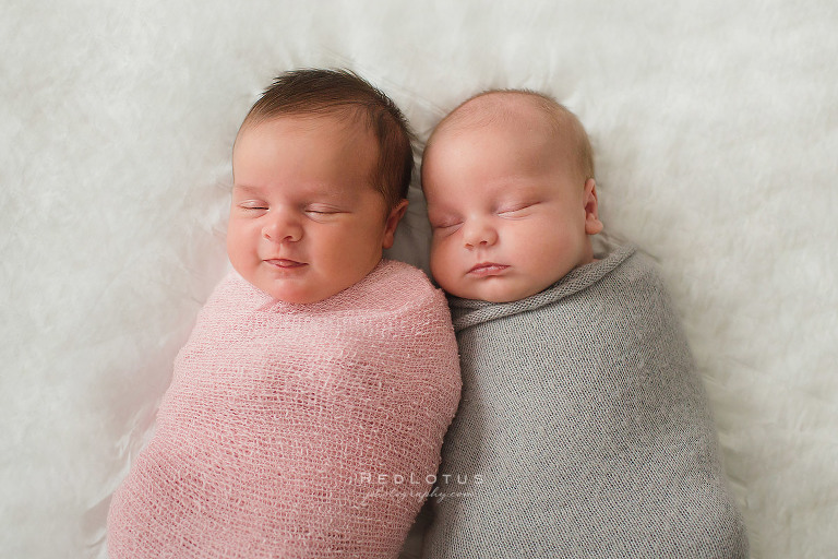 fraternal twin newborn babies brother sister pink grey