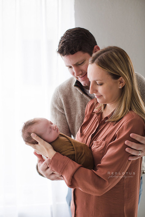newborn photographer Pittsburgh parents and baby pose