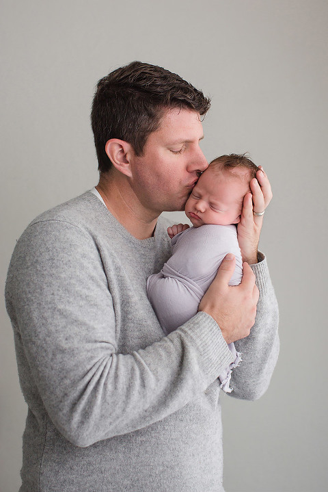 newborn photography baby and father pose