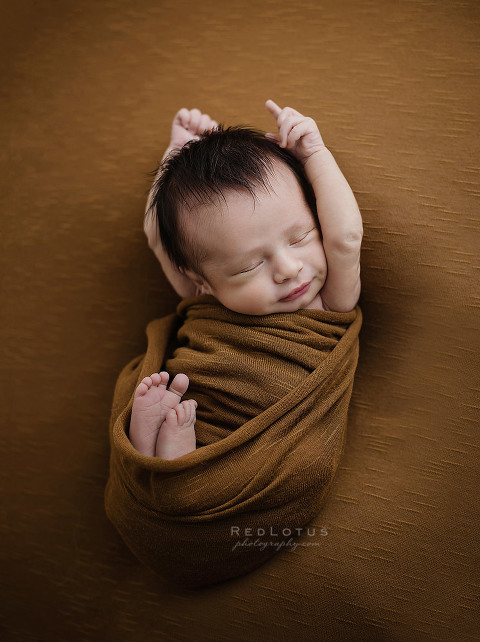 newborn baby stretching