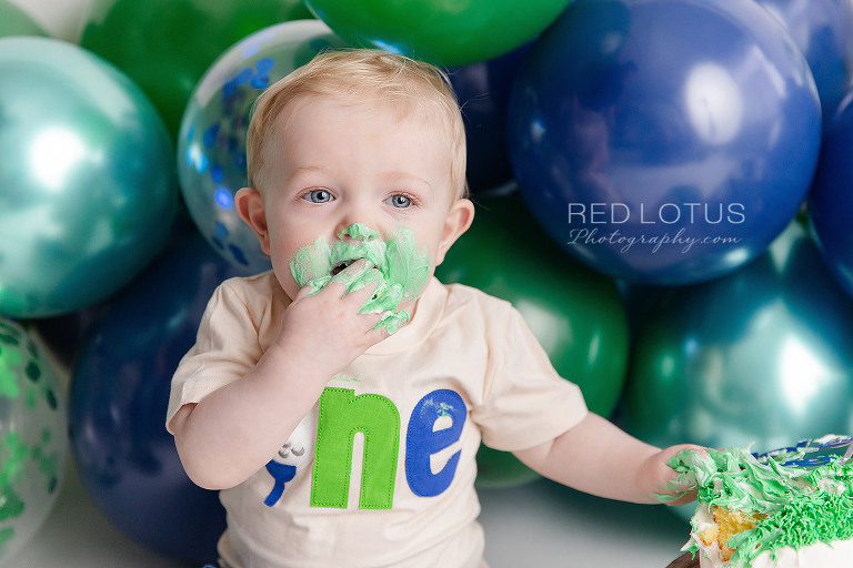 golf themed cake smash photo session for one year old boy