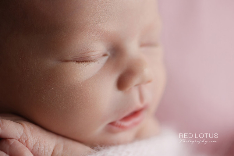 newborn photography baby girl close up of face