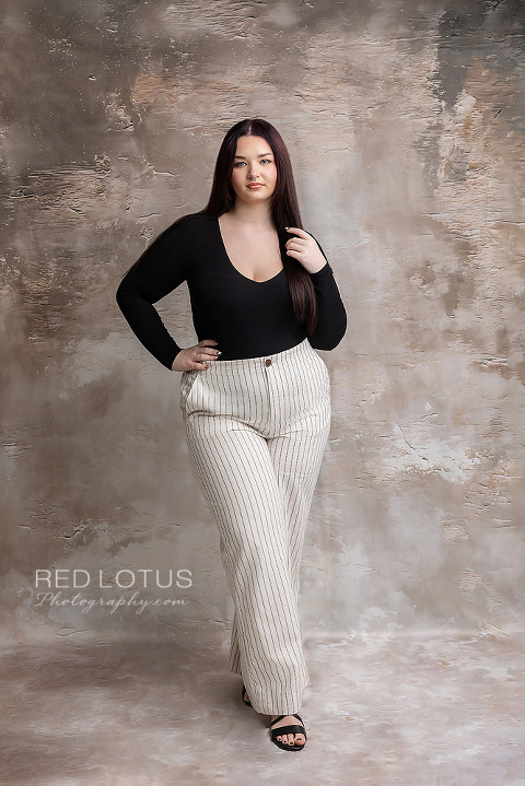 high school senior girl studio photo textured backdrop